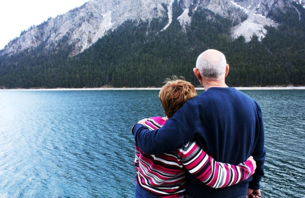 retired couple lake