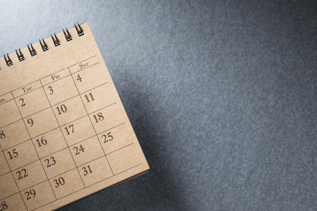 desk calendar on blank desk