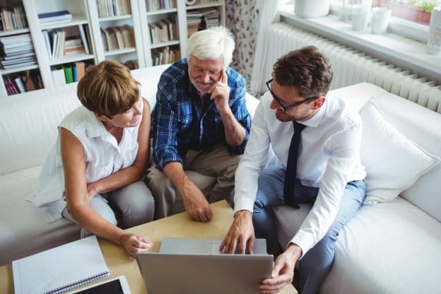 Senior clients with financial advisor